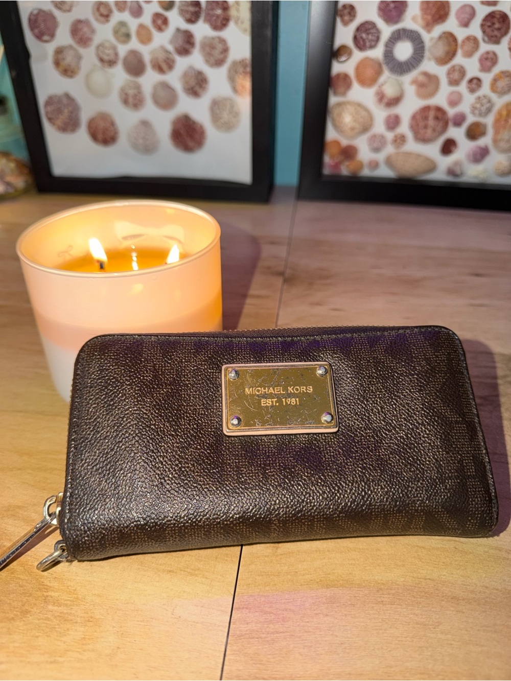 Michael Kors dark brown leather zip-around wallet with gold plaque